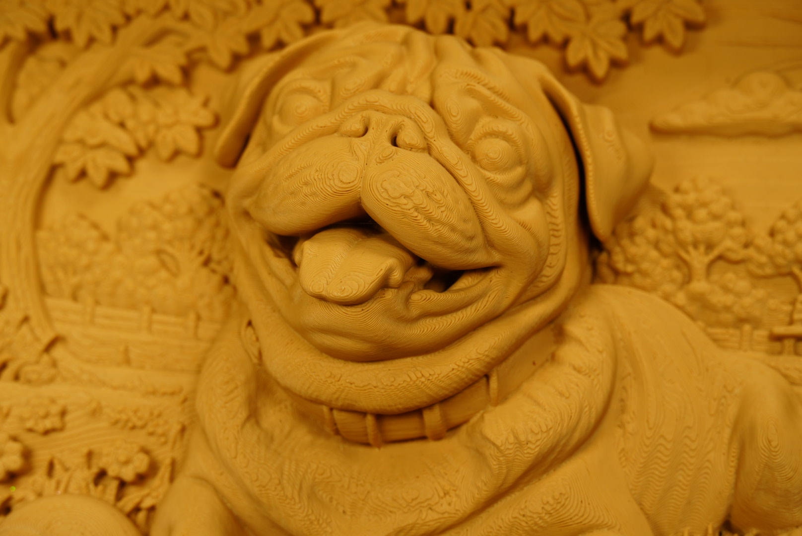Detailed close-up of the sculpted bulldog face in the photo relief frame